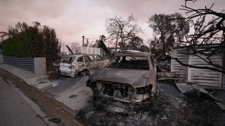 16 dead, 16 missing as fire crews try to corral Los Angeles blazes before winds return this week.